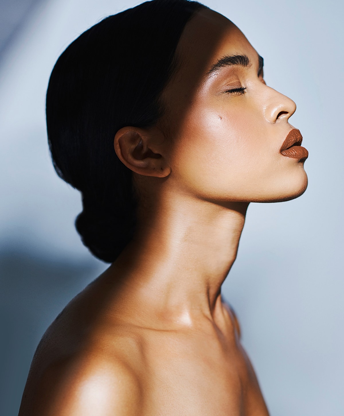 Close-up of woman with minimalistic makeup.