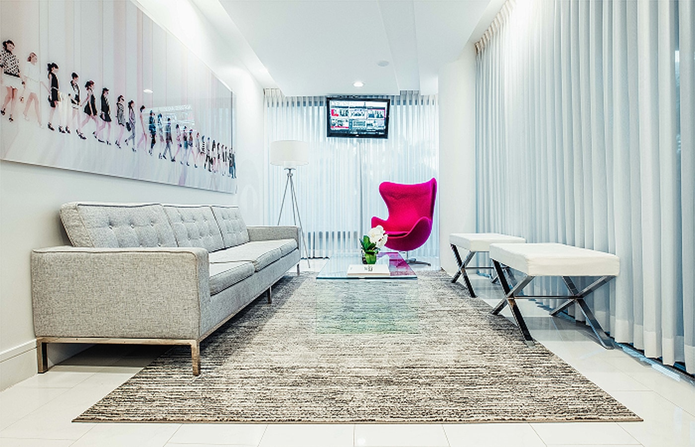 Modern living area with stylish furniture and decor.