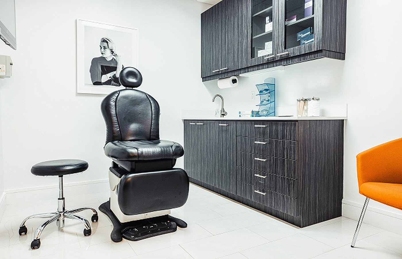 Modern medical office interior with treatment chair.